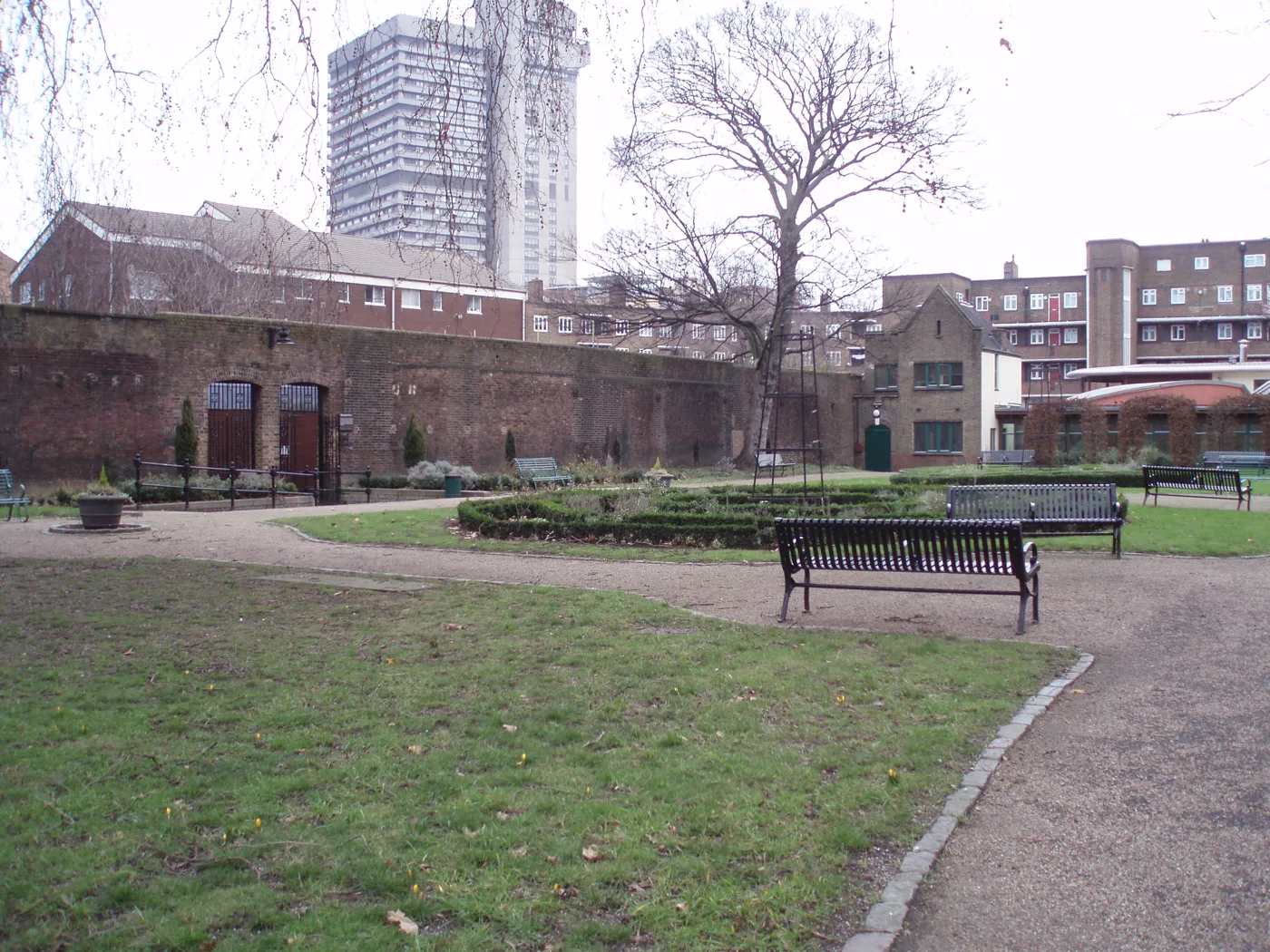 The coroner's court in Tennis Street, Southwark, is the low building on the right, seen from St George's Gardens beside the old Marshalsea prison wall. The photograph was taken some years before this week's hearing.